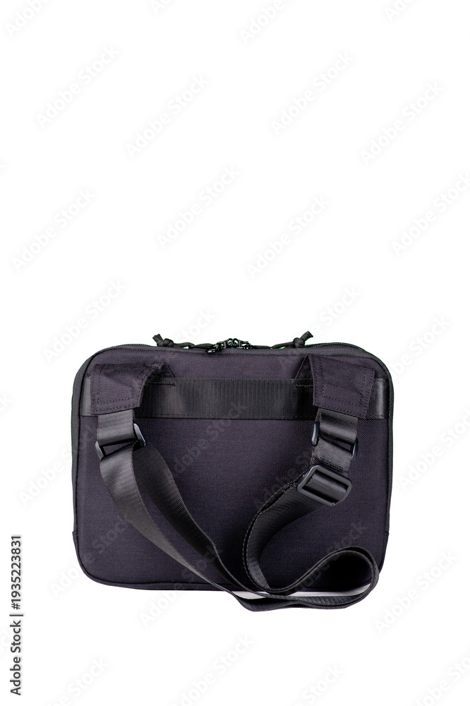 Naklejka premium A small black bag with a long adjustable handle.