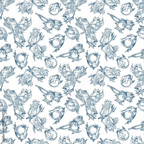 Seamless pattern on a white background with dark blue hazelnuts.