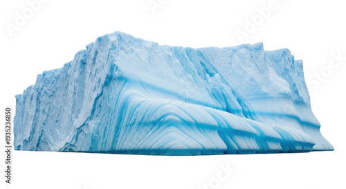 Isolated iceberg with bright blue striations and natural glacial patterns on a sunny day