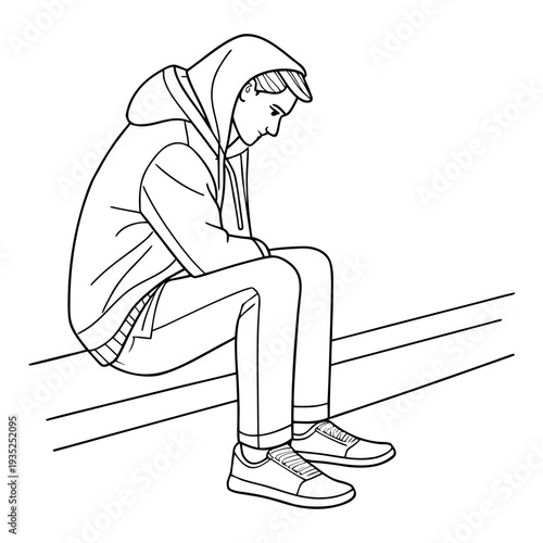 Person wearing a hoodie sits looking downward.