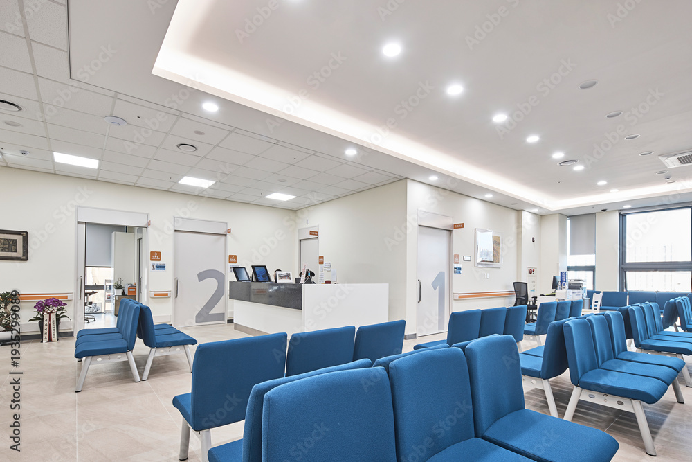 © Namsun - Clean modern hospital or clinic interior with patient beds and medical facility lighting. © Namsun - Clean modern hospital or clinic interior with patient beds and medical facility lighting.