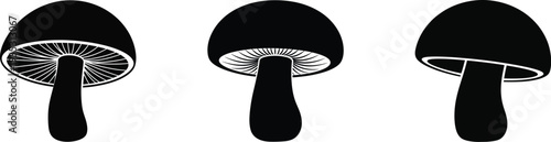 Black mushroom silhouettes with white gills on white background
