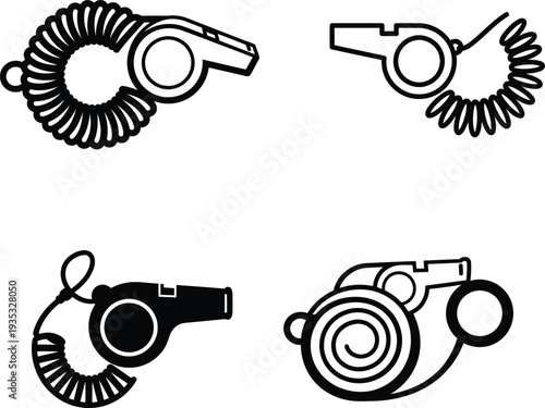 Four different designs of whistles with cords attached for referees and coaches