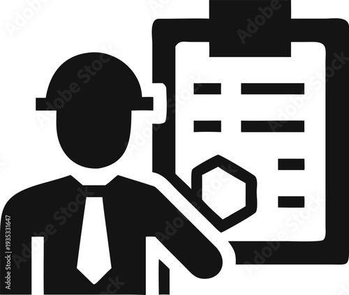 Industrial professional wearing a hard hat reviews a critical project checklist on a clipboard for site inspection