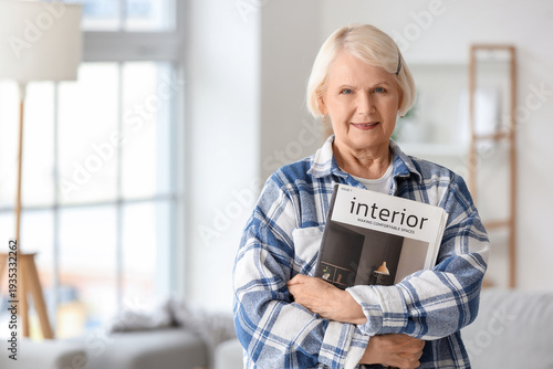 Senior woman with magazine ...
