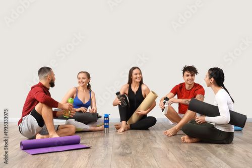 Group of sporty people with...