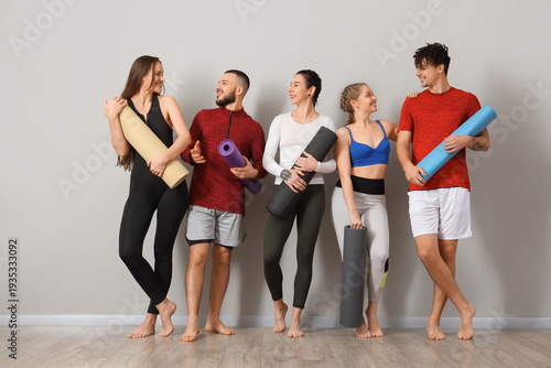 Group of sporty people with...