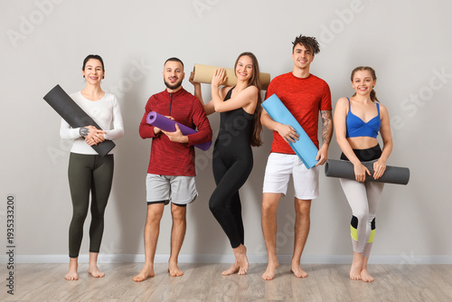 Group of sporty people with...