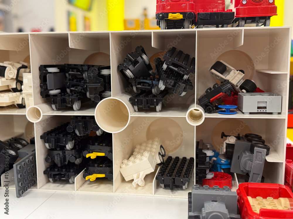 Fototapeta premium Lego parts in small cubby storage