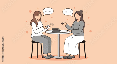 Two women having a conversation over coffee at a small table.