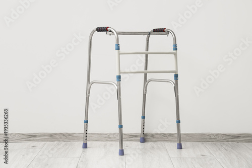 Medical walker near light w...