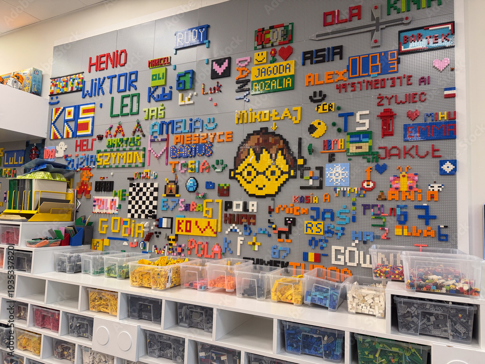 Fototapeta premium Colorful lego mosaic wall with sorted bins