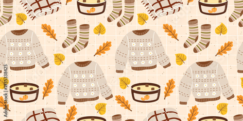 Fall autumn sweater with socks and winter knitwear, knitted in a seamless pattern from soft yarn for cozy vibes, cute leaves, and a repeat background. Cozy comfortable warm design through leaf