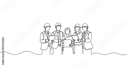 Team of young multiracial engineers reviewing plans together. No editable stroke