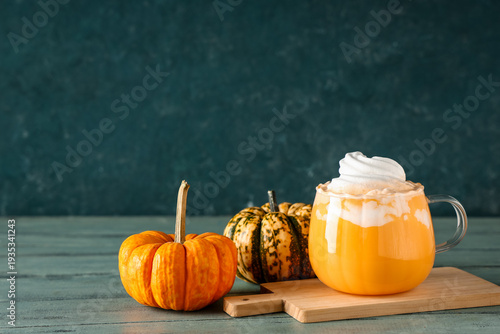 Glass of orange pumpkin spi...