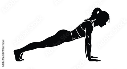 Silhouette of a woman performing a plank exercise in a studio