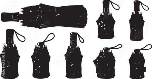 Collection of black umbrellas in various positions and shapes