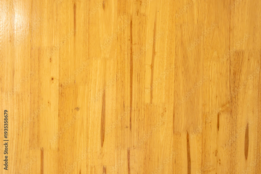 Fototapeta premium Top view of light brown wood texture background with natural parquet pattern