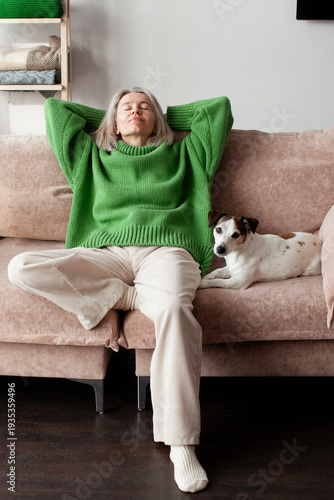 Canvastavla Full length smiling woman resting, sleeping on cozy couch at home, peaceful attr