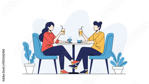 Young couple sitting at a cafe table enjoying refreshing drinks and having a pleasant conversation together.