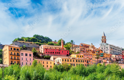 beautiful panoramic landscape of european colorful town in old vintage style with beautiful towers and facades in touristic summer season. Urban view of italian city during summer day on evening.