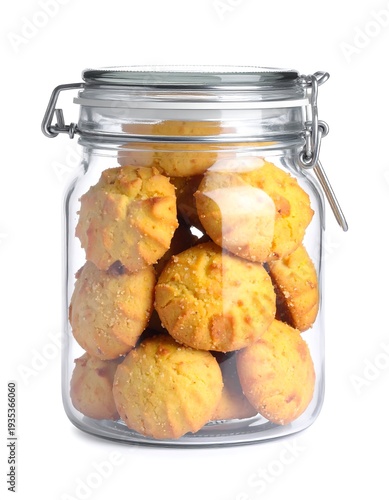 Close-up of a glass jar filled with fresh, golden-brown cookies