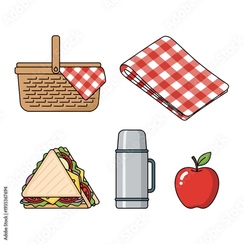 Picnic setup with basket, blanket, sandwich, thermos, and apple arranged neatly