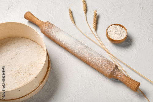 Wooden sieve, rolling pin, ...