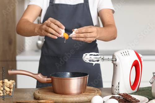 Woman with mixer separating...