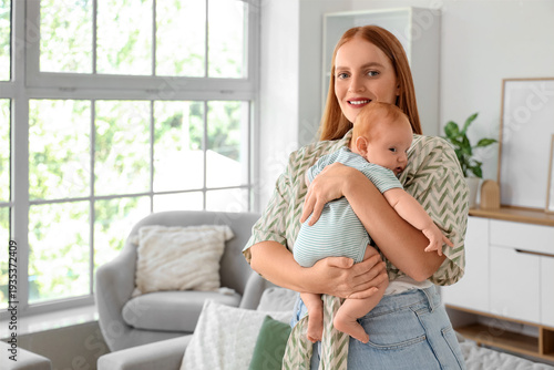 Beautiful young mother with...