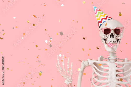 Human skeleton in party hat...