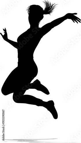 A happy woman jumping for j...