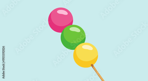 Colorful Dango Skewers on Blue Background