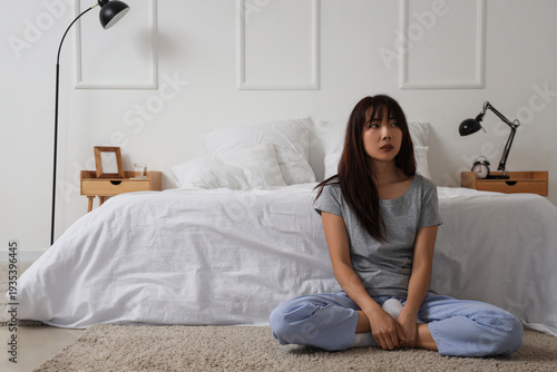 Young Asian woman with suic...