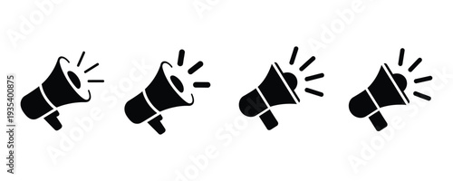 Set of four black megaphone icons with dynamic motion lines