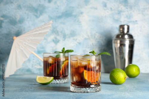 Glasses of cold Cuba Libre ...