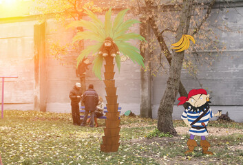 Wandcirkels Piraten Piraten in herfstpark met palmboom  © Vital