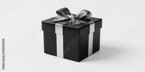 Black gift box with silver ribbon and bow. Minimalist background highlights elegant presentation. Smooth surfaces reflect soft studio lighting. Perfect for luxury or festive occasions
