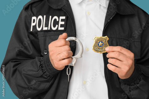 Male police officer with ha...