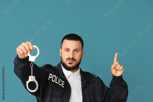 Male police officer with ha...