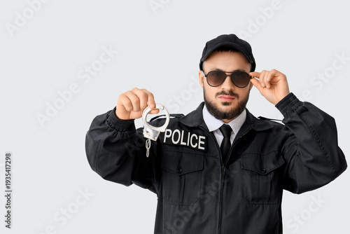 Male police officer in sung...