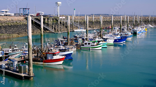 Fishing port and metal pilings allowing the platforms to slide with the tides at Saint-Cast-le-Guildo, a commune in the Côtes-d'Armor department of Brittany in northwestern France