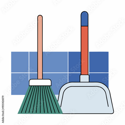 Broom and dustpan in colorful design against tiled background  