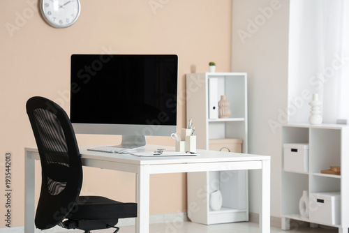 Workplace with blank comput...