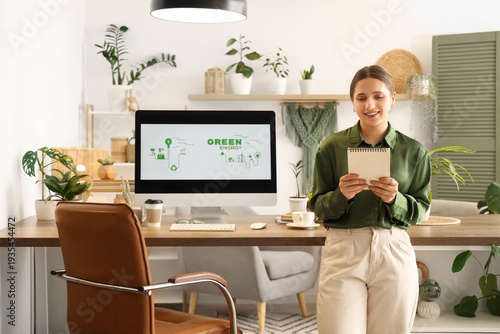 Female engineer with notebo...