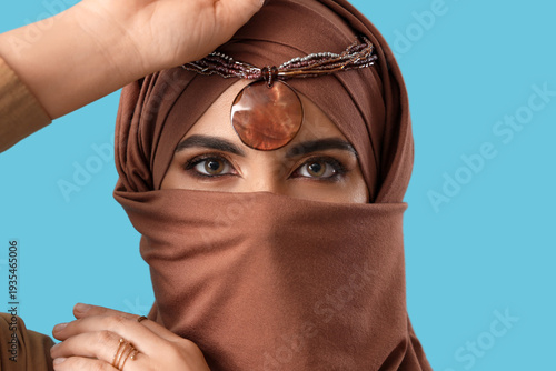 Beautiful Muslim woman in b...