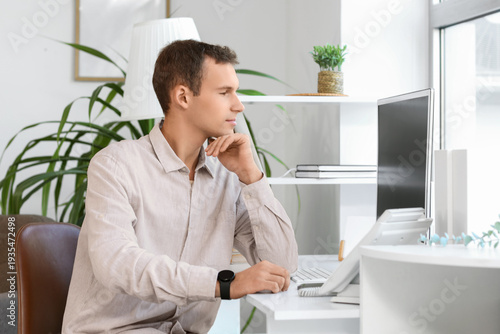 Young businessman working a...