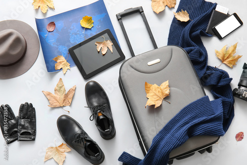 Stylish suitcase with moder...