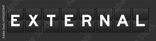 Black color analog flip board with word external on gray background