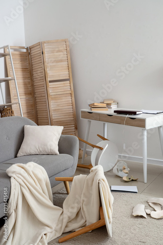 Interior of messy living ro...